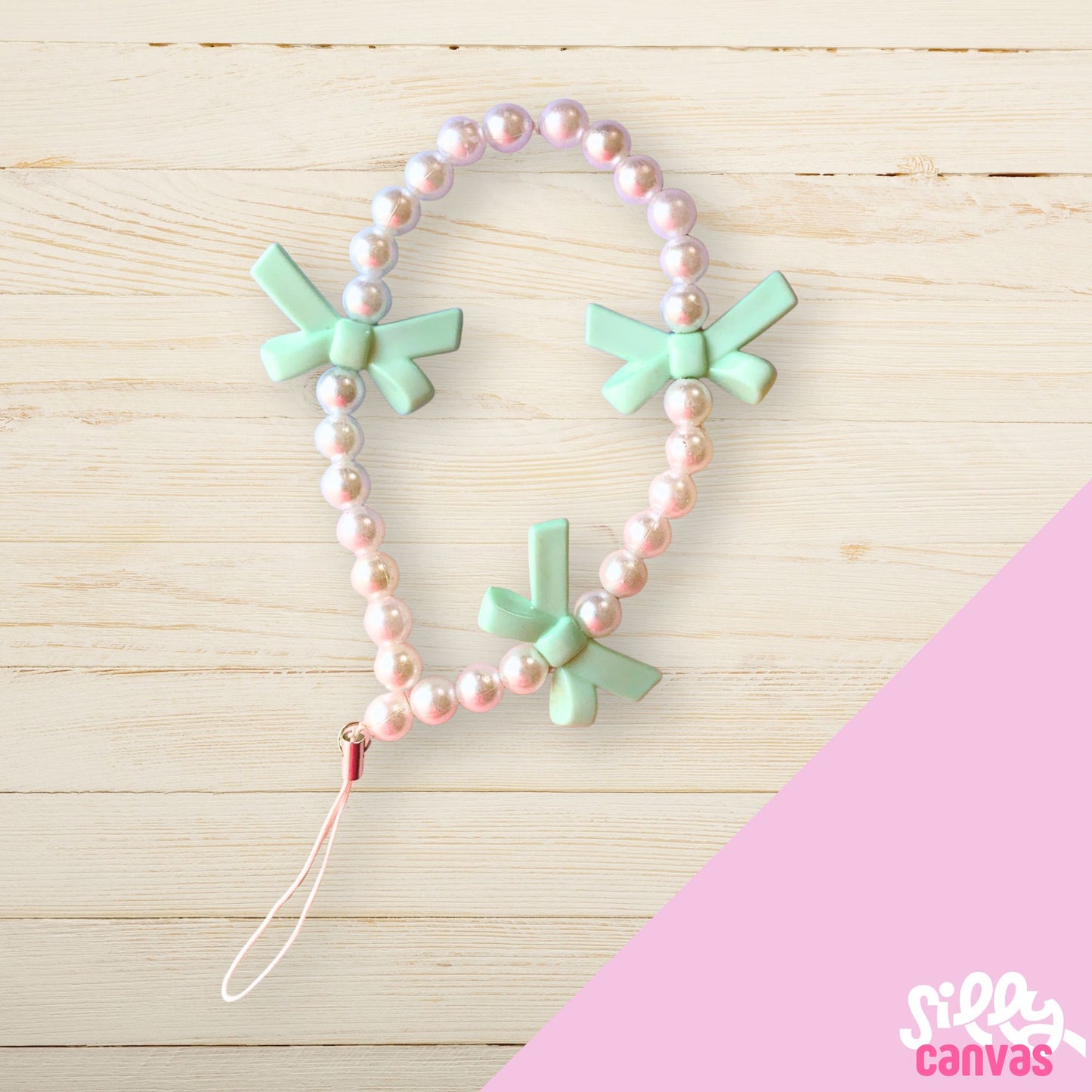 Green bow phone charm with white beads