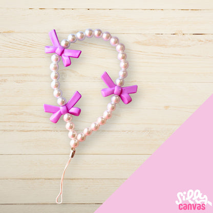 Purple bow phone charm with white beads